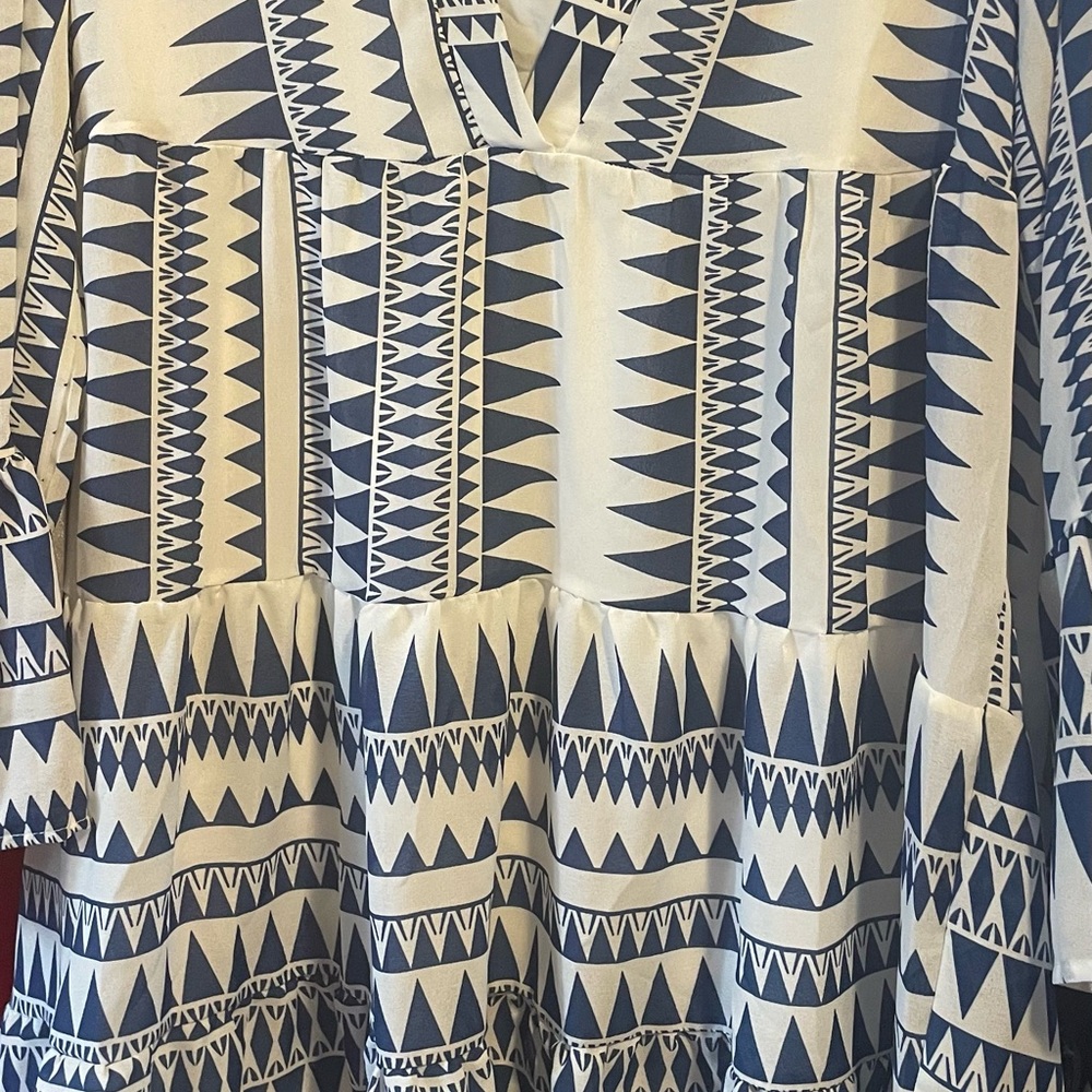 Medium, white and blue, long sleeves, blouse.